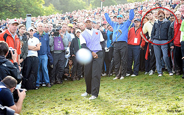 Tiger Woods Hits Camera Photographer